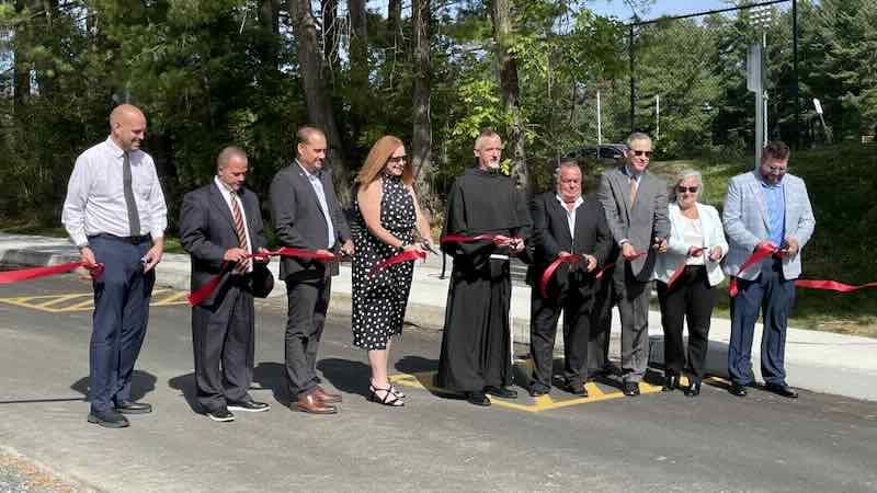 Officials Cutting Ribbon at St. Catherine's Street reopening ceremony